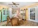 Eat-in kitchen area with glass table and wicker chairs at 914 Springdale Ln, Gastonia, NC 28052