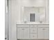 Double vanity bathroom with white cabinets at 1050 Bull Dog Ln, Wingate, NC 28174
