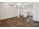 Open concept dining room with kitchen views and hardwood floors at 1050 Bull Dog Ln, Wingate, NC 28174