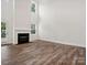 Bright Gathering room with hardwood floors, fireplace and high ceilings at 1050 Bull Dog Ln, Wingate, NC 28174