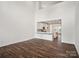 Open Gathering room with hardwood floors and kitchen views at 1050 Bull Dog Ln, Wingate, NC 28174