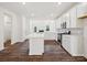 Modern kitchen with white cabinets, quartz countertops, and stainless steel appliances at 1050 Bull Dog Ln, Wingate, NC 28174