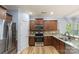 Kitchen with stainless steel appliances and granite countertops at 2202 Chickasaw Loop, Rock Hill, SC 29732