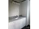 Bathroom with granite countertop, white cabinets, and black faucet at 2668 Polo Ln, Maiden, NC 28650