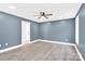 Simple bedroom with grey walls and hardwood floors at 2668 Polo Ln, Maiden, NC 28650