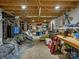 Unfinished basement with workshop area and storage shelves at 294 Carroll Cv, Clover, SC 29710