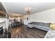 Open concept living room and kitchen with gray sectional sofa at 4021 Eckels Dr, Charlotte, NC 28215