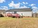 House with deck, fenced backyard, and storage shed at 5136 Wheat Sw Dr, Concord, NC 28027
