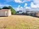 Large backyard with storage shed and wooden fence at 5136 Wheat Sw Dr, Concord, NC 28027