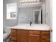 Bathroom with vanity, large mirror, and updated fixtures at 5136 Wheat Sw Dr, Concord, NC 28027