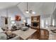 Living room featuring hardwood floors, fireplace and lots of natural light at 618 Westglen Pl, Lancaster, SC 29720