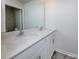 Modern bathroom with double sinks and a large mirror at 7865 Whispering Stream Dr, Sherrills Ford, NC 28673
