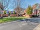 Landscaped community entrance with brick walls and a grassy area at 884 Park Slope Dr, Charlotte, NC 28209