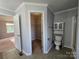 Bathroom with toilet and built-in storage at 2110 Zion Church Rd, Hickory, NC 28602