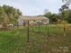 Home exterior with a vineyard in the background at 2110 Zion Church Rd, Hickory, NC 28602