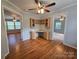 Home office with wood floors and built-in cabinetry at 2110 Zion Church Rd, Hickory, NC 28602