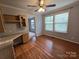 Home office with built in desk and hardwood floors at 2110 Zion Church Rd, Hickory, NC 28602