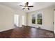Bedroom with ceiling fan and access to bathroom at 305 Elm St, Lancaster, SC 29720