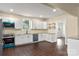Modern kitchen with white cabinets and granite countertops at 305 Elm St, Lancaster, SC 29720