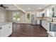 Open concept kitchen with stainless steel appliances and island at 305 Elm St, Lancaster, SC 29720