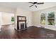 Living room featuring a fireplace and hardwood floors at 305 Elm St, Lancaster, SC 29720