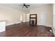 Spacious living room with hardwood floors and a fireplace at 305 Elm St, Lancaster, SC 29720