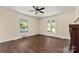Living room with hardwood floors, fireplace and large windows at 305 Elm St, Lancaster, SC 29720