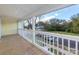 Covered porch overlooking the street and neighborhood at 305 Elm St, Lancaster, SC 29720