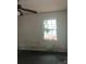 Small bedroom needing some TLC, features a window at 3227 Rogers St, Charlotte, NC 28208