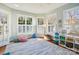 Sunlit playroom featuring ample natural light and storage at 3405 Abbey Hill Ln, Charlotte, NC 28210