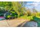 Landscaped backyard with gazebo and spacious patio at 3703 Margaret Wallace Rd, Matthews, NC 28105