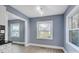 Bright dining area with wood flooring and view of the backyard at 3703 Margaret Wallace Rd, Matthews, NC 28105