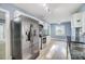 Modern kitchen with stainless steel appliances and granite countertops at 3703 Margaret Wallace Rd, Matthews, NC 28105