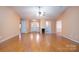 Hardwood floor living room with access to other rooms at 103 Prestwick Ct, Salisbury, NC 28146