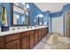 Double vanity bathroom with a large shower and a view of the bedroom at 4022 Blackburn Ct, Fort Mill, SC 29707