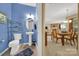 Convenient powder room with pedestal sink and view to the dining area at 4022 Blackburn Ct, Fort Mill, SC 29707