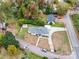 Aerial view of the property, showing house, driveway, and yard at 504 N Pine Ln, Wadesboro, NC 28170