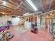 Unfinished basement with ample storage space at 504 N Pine Ln, Wadesboro, NC 28170