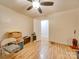 Bedroom with wood floors and ceiling fan, ready for your furniture at 504 N Pine Ln, Wadesboro, NC 28170