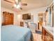 Spacious bedroom with ensuite bathroom and ceiling fan at 504 N Pine Ln, Wadesboro, NC 28170