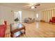 Bright living room with hardwood floors and lots of natural light at 504 N Pine Ln, Wadesboro, NC 28170
