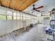 Bright screened porch with wood-look flooring and ceiling fan at 504 N Pine Ln, Wadesboro, NC 28170