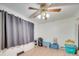 Empty spare bedroom with hardwood floors and gray curtains at 504 N Pine Ln, Wadesboro, NC 28170