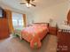 Spacious bedroom with a king-size bed and wood furniture at 507 Texas Trl, Dallas, NC 28034