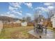 Fenced backyard with a patio and seating area, perfect for outdoor enjoyment at 7546 Lady Liberty Ln, Charlotte, NC 28217