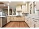 Bright kitchen boasts granite countertops and a large island at 8058 Edgewater Dr, Norwood, NC 28128