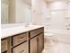 Bathroom with single vanity, tub, and toilet at 14862 Tamarack Dr, Charlotte, NC 28278
