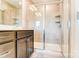 Bathroom with single vanity, shower, and linen shelving at 14862 Tamarack Dr, Charlotte, NC 28278