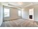 Spacious bedroom with carpeted floors and two windows at 14862 Tamarack Dr, Charlotte, NC 28278