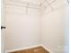 Large closet with wire shelving; ready for clothes at 14862 Tamarack Dr, Charlotte, NC 28278